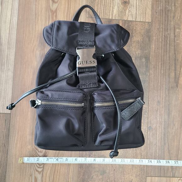 Guess Alpena Nylon Drawstring Satchel Flap Buckle Closure Mini Black Backpack - Picture 9 of 11